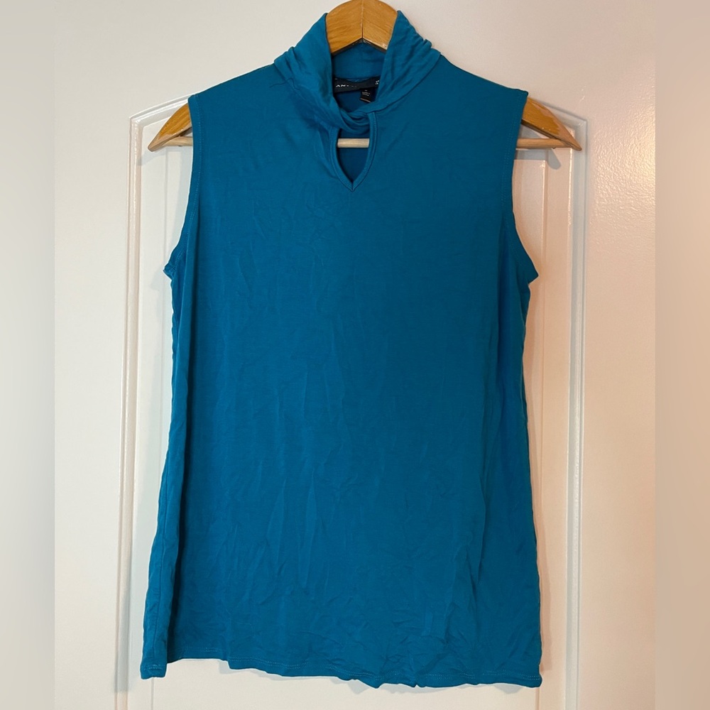ANTTHONY teal shirt.